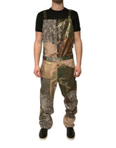 A male model wearing a Dolce & Gabbana multicolor patchwork camouflage jumpsuit/overall.
